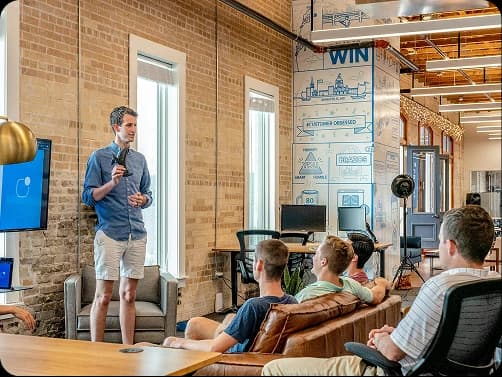 A business team meeting in an open-plan office