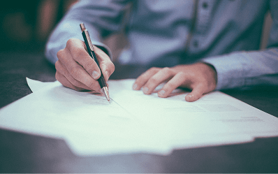 A person signing a document