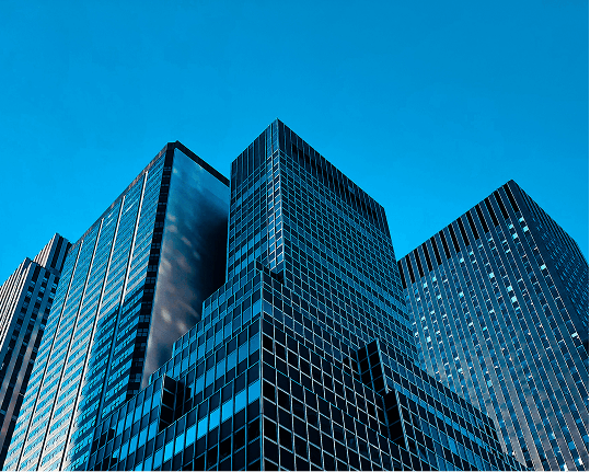 Dealer Solutions - Modern skyscraper architectures representing operational scale