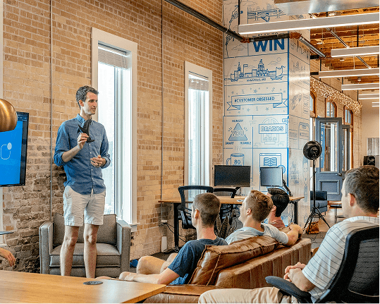 Team collaborating in a modern office representing lead and CRM integrations