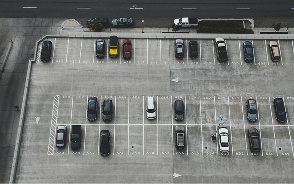 An aerial view of cars on a parking structure